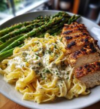 greek chili chicken alfredo recipe with smoked feta cream crispy parmesan asparagus