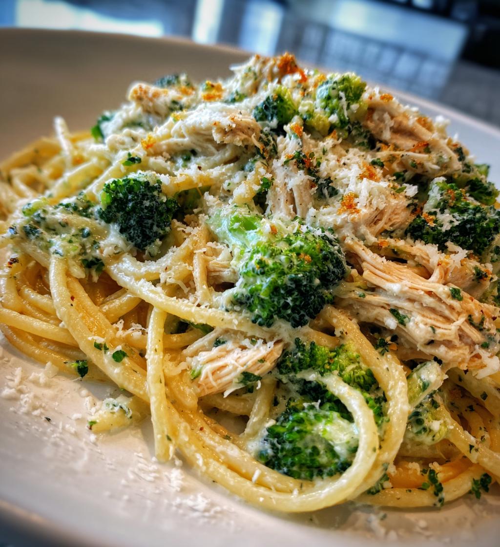 pesto chicken alfredo with spicy feta cream parmesan broccoli crunch