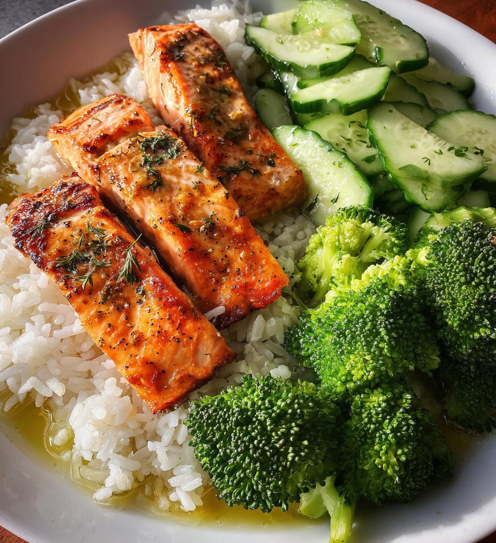 salmon broccoli rice cucumber plate